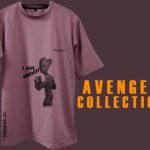 White oversized t-shirt featuring Avengers characters in abstract comic art style" Caption: Earth's mightiest style – the Avengers tee brings comic book vibes to your closet.