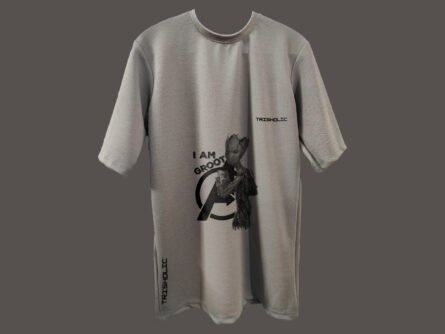 Model wearing black Trisholic oversized t-shirt with minimalist logo print" Caption: Keep it clean. The classic Trisholic tee in jet black is a wardrobe essential.