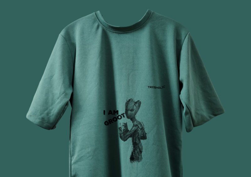 Close-up of high-quality cotton fabric of Trisholic t-shirt" Caption: Built for comfort. Made with breathable cotton and premium feel.