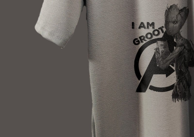 Trisholic oversized t-shirt with Captain America’s shield design on the back" Caption: Lead with style – the Captain tee is a tribute to timeless heroes.
