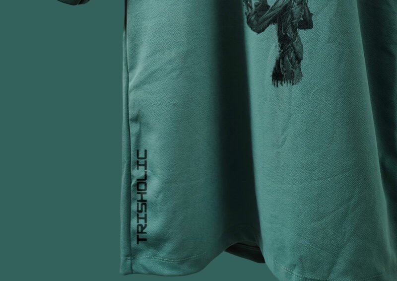 Trisholic oversized t-shirt with Captain America’s shield design on the back" Caption: Lead with style – the Captain tee is a tribute to timeless heroes.