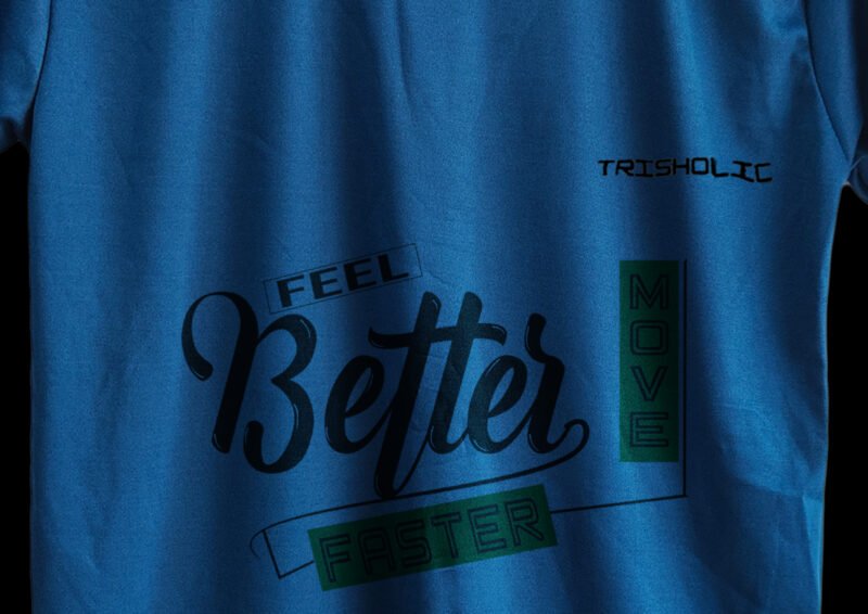 Folded stack of matte blue Feel Better printed t-shirts
