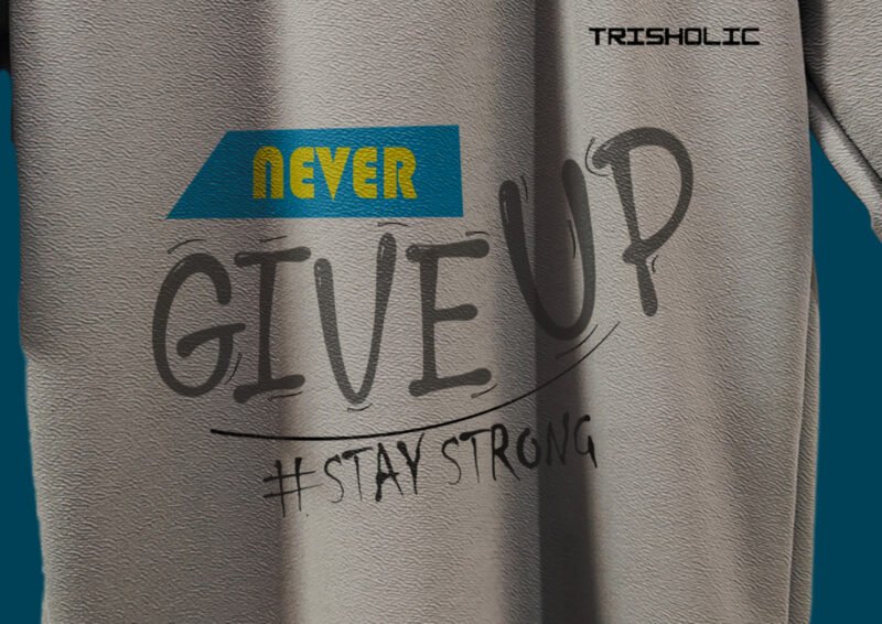 Model wearing Never Give Up t-shirt in urban setting