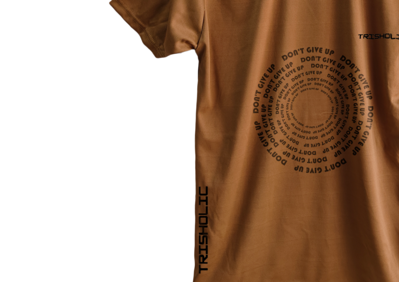 Black streetwear-inspired tee from Trisholic with bold white text “Dream. Plan. Execute.”