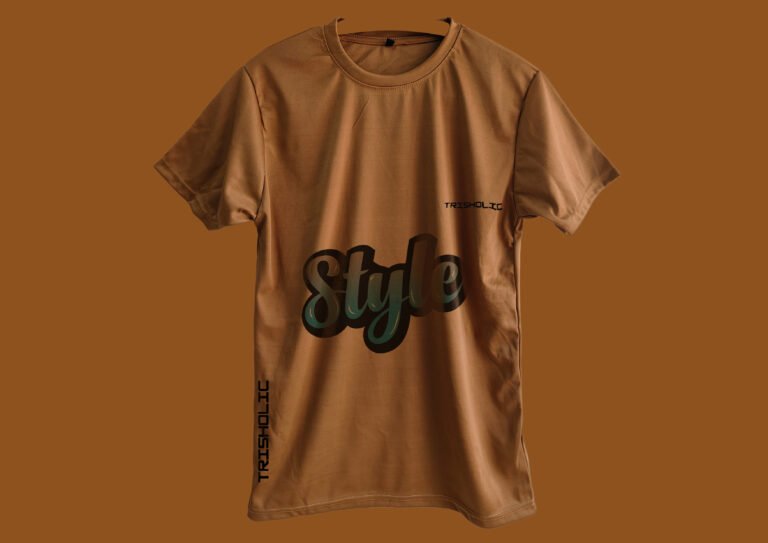Person relaxing outdoors in peach Trisholic printed t-shirt