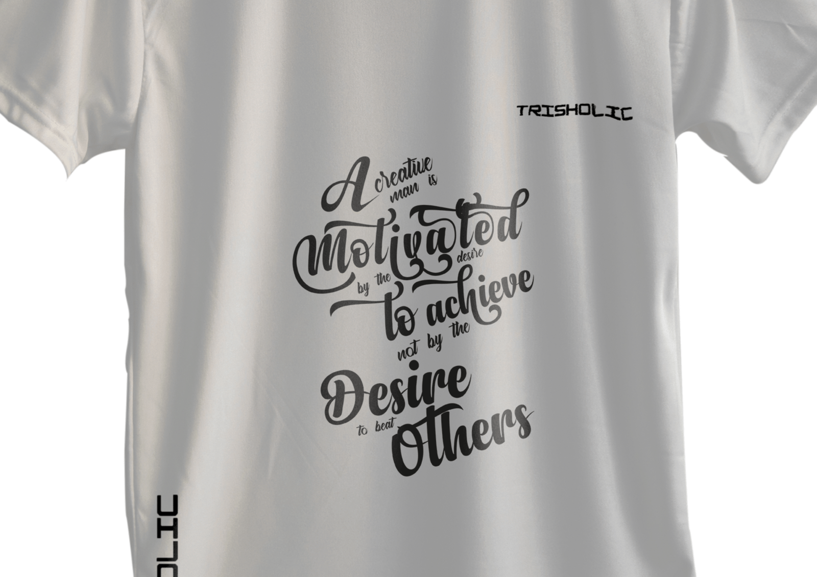 Black Trisholic t-shirt with bold white quote “Hustle Hard Stay Humble” across the chest.