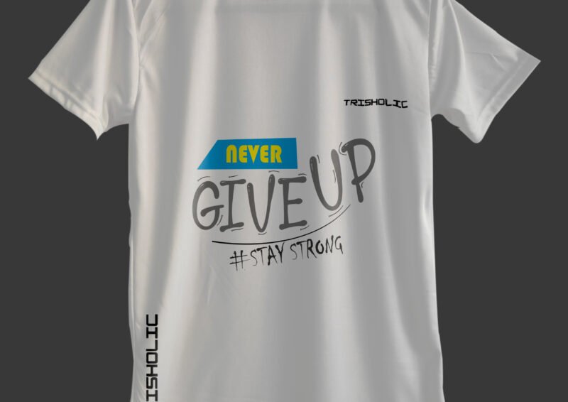 Stack of folded white Never Give Up t-shirts