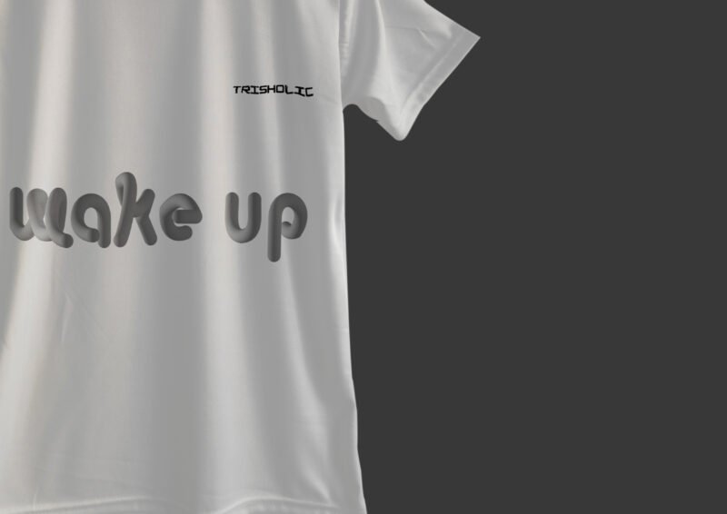 Folded white Wake Up t-shirts stacked neatly for display