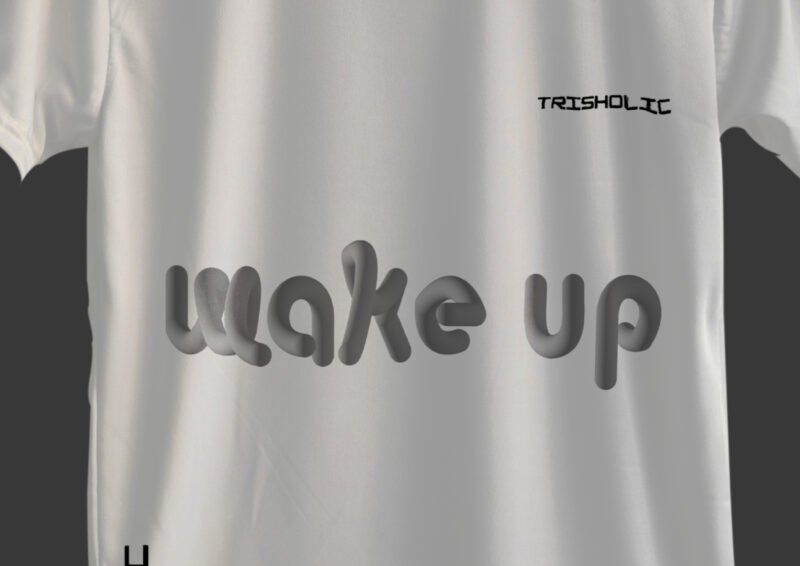 Close-up of “Wake Up” printed design on white cotton t-shirt