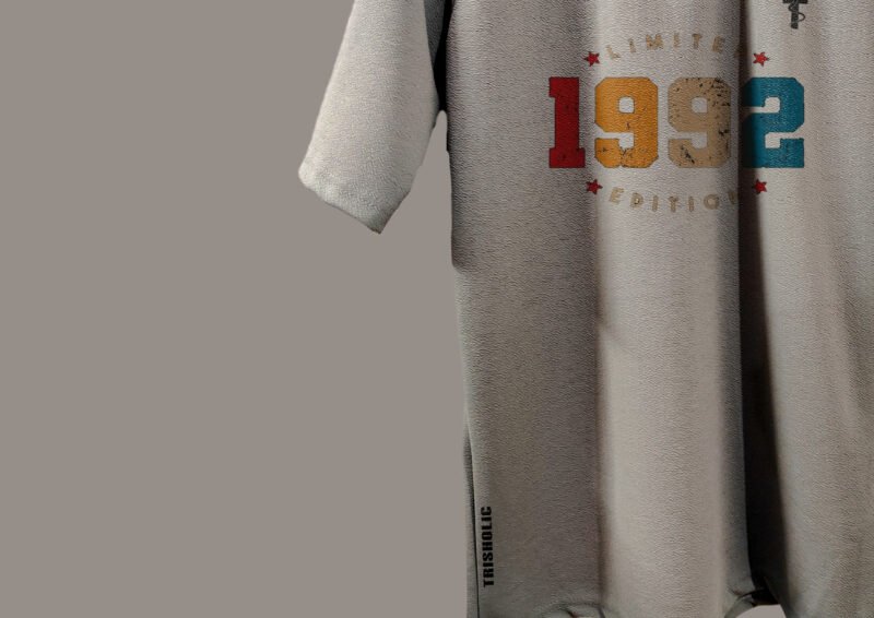 Close-up of cotton fabric and print on Trisholic 1992 tee