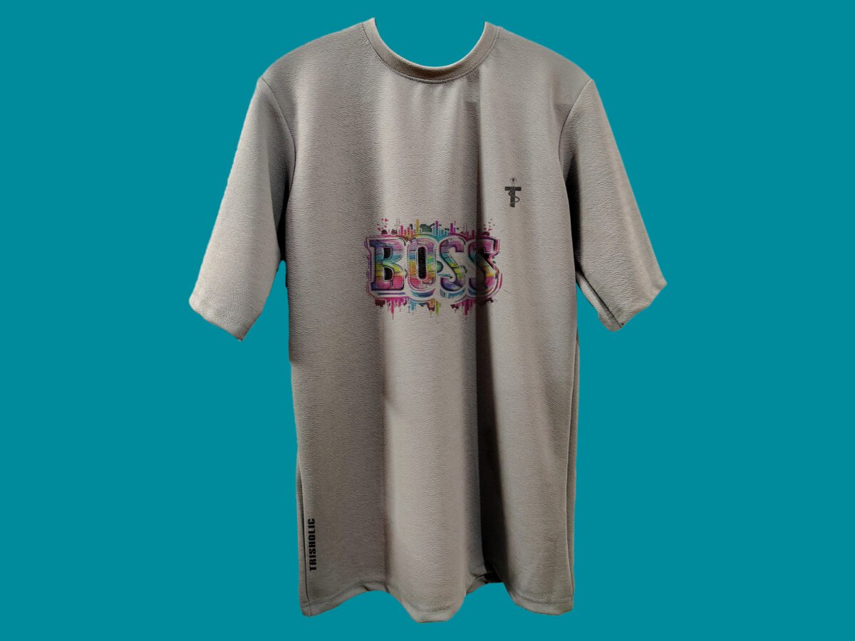Model wearing oversized Trisholic tee with Boss quote