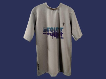 Model wearing oversized Trisholic tee with Desire quote