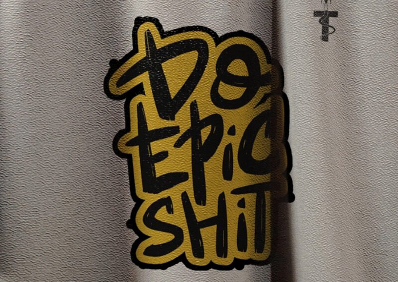 Close-up of Do Epic Shit print on Trisholic oversized t-shirt
