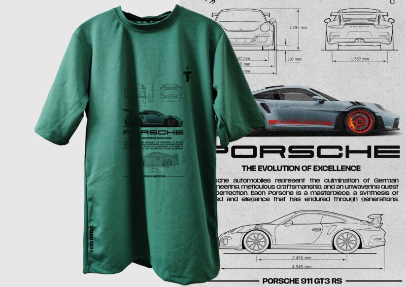 Close-up of Porsche car design on green tee