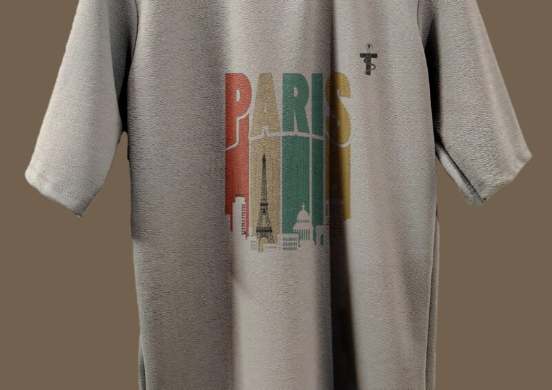 Side view of model wearing Paris word printed grey Trisholic t-shirt