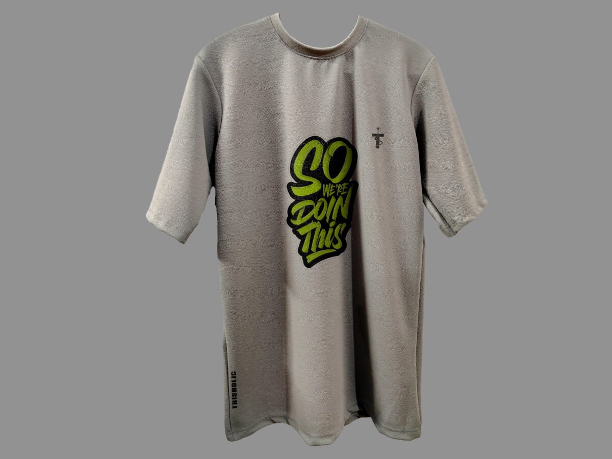 Front view of So We Are Doing This quote printed grey Trisholic T-shirt on hanger
