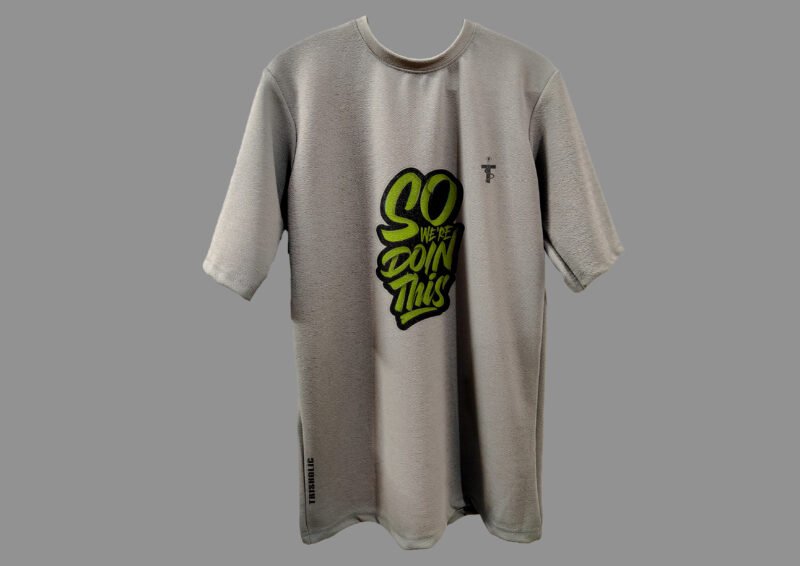 Front view of So We Are Doing This quote printed grey Trisholic T-shirt on hanger