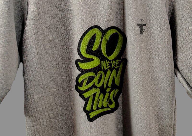 Close-up of the quote print on Trisholic grey t-shirt