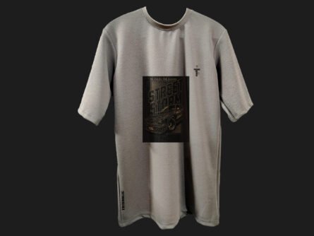 Side profile showing the drop shoulder cut of the grey tee