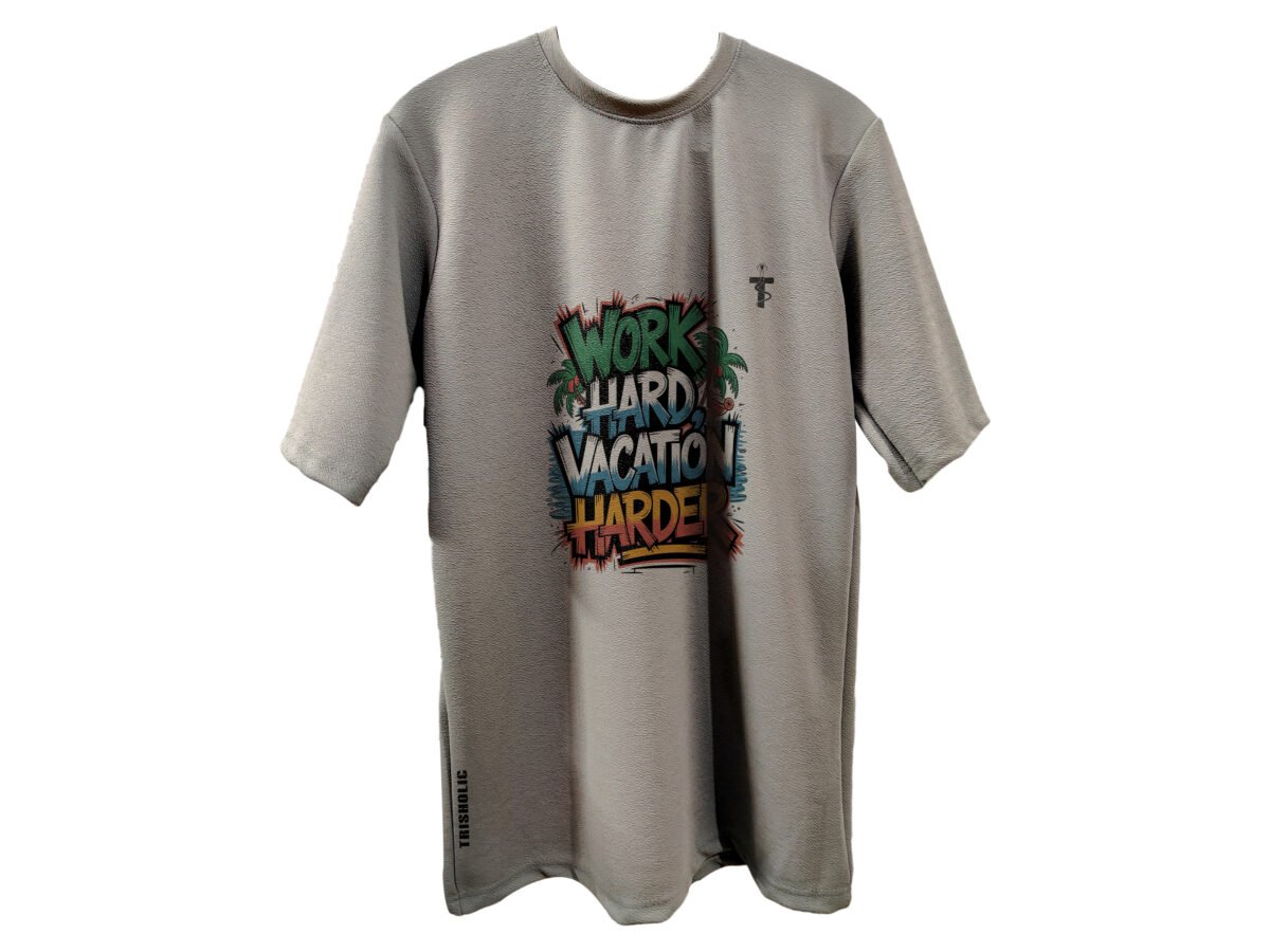 Model in beachwear pairing grey quote tee with shorts