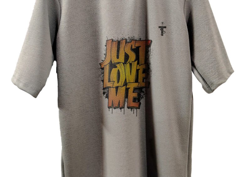 Close-up of Just Love Me print on tee