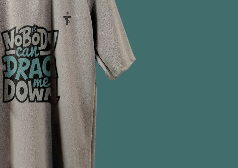 Flat lay of motivational quote printed t-shirt
