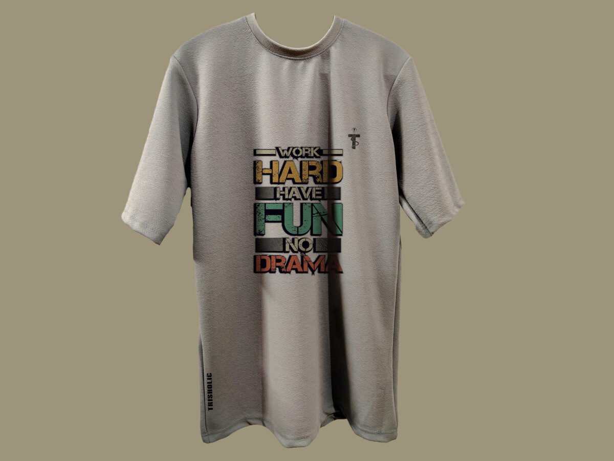 Model wearing Trisholic oversized t-shirt with Work Hard Have Fun No Drama quote