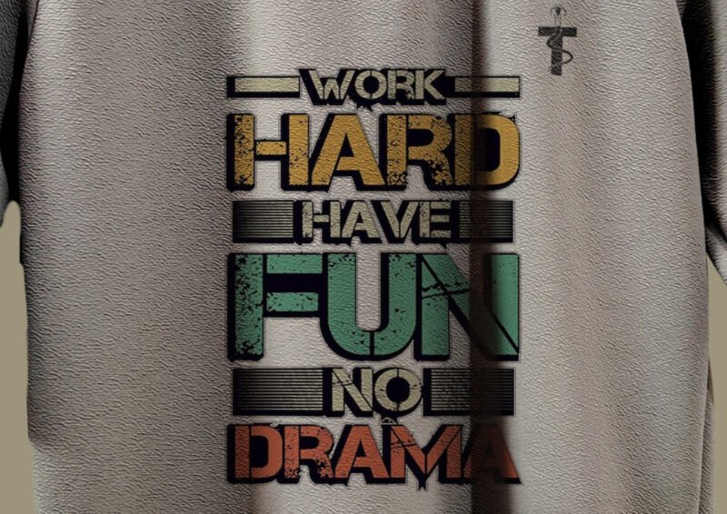 Close-up of Work Hard Have Fun No Drama print on Trisholic tee