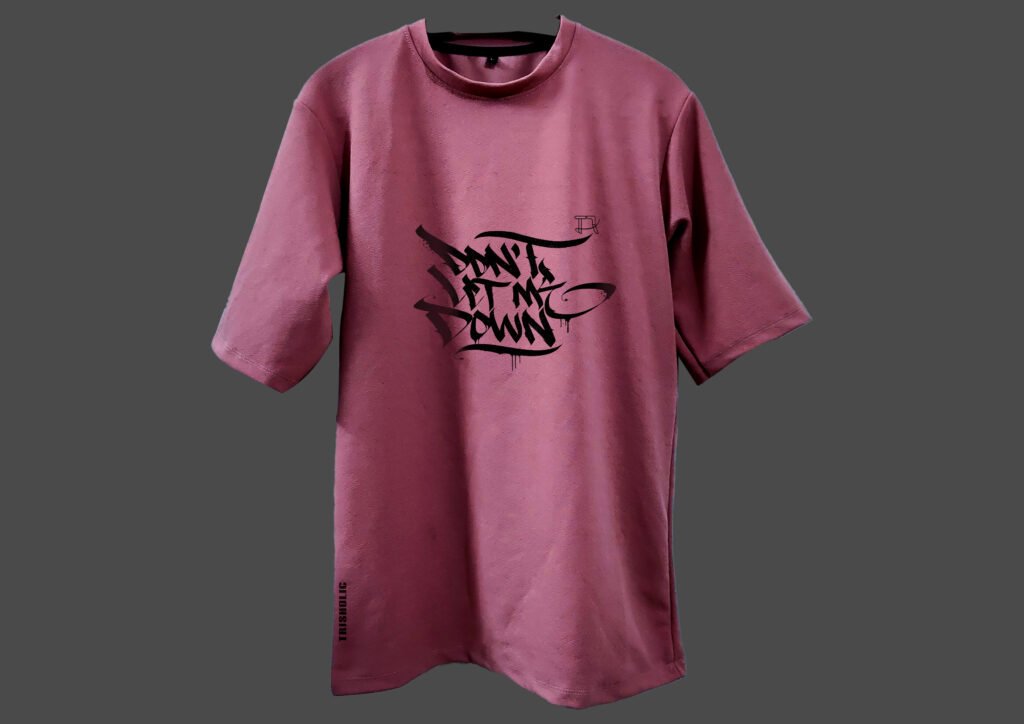 Flat Lay of T-Shirt with Quote and Color Gradient