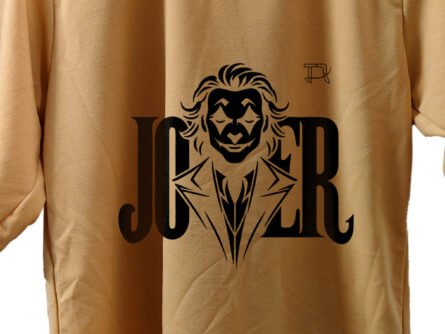 Model in peach Joker tee on street