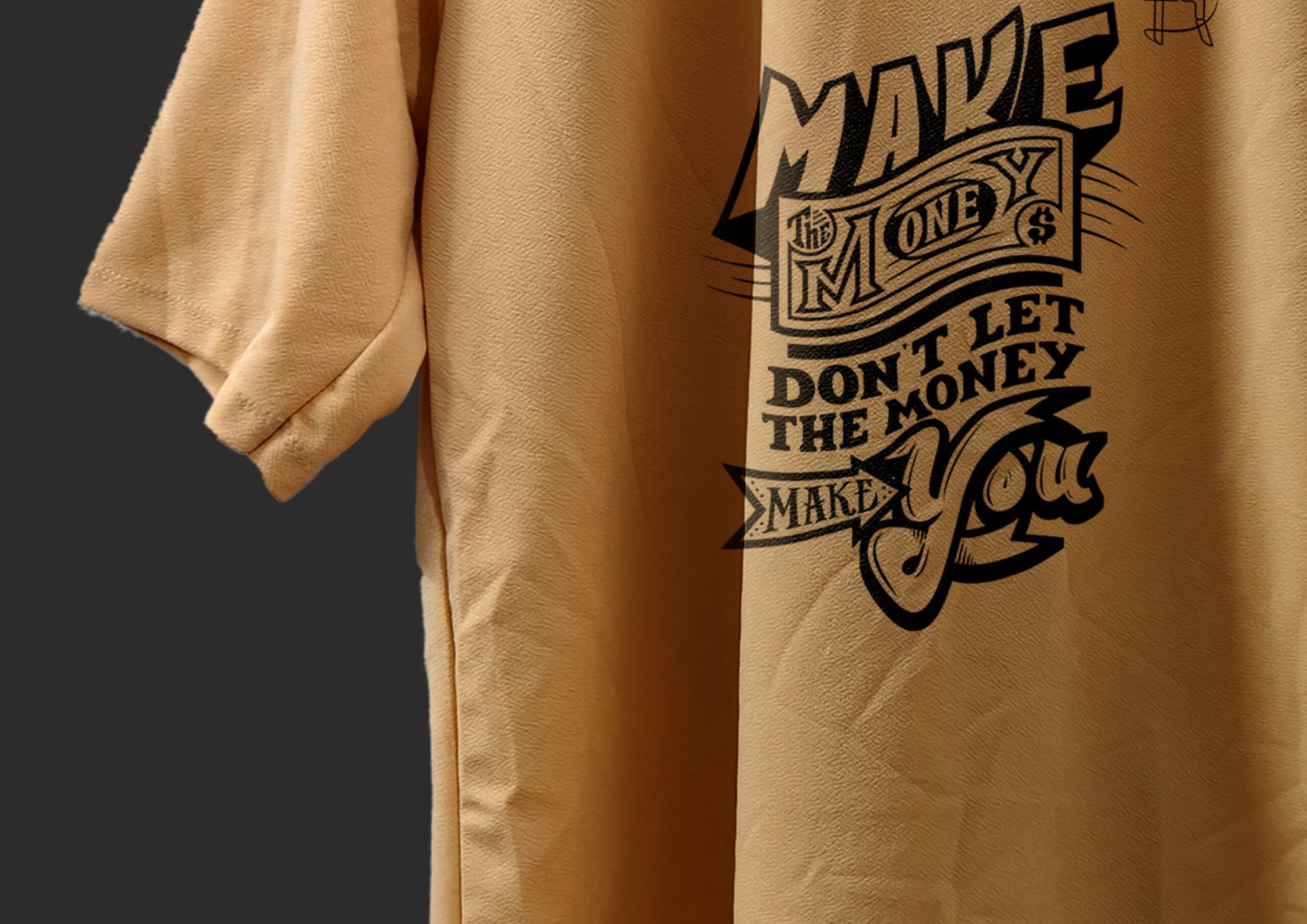 Folded Peach T-Shirt with “Make Money” Quote Visible