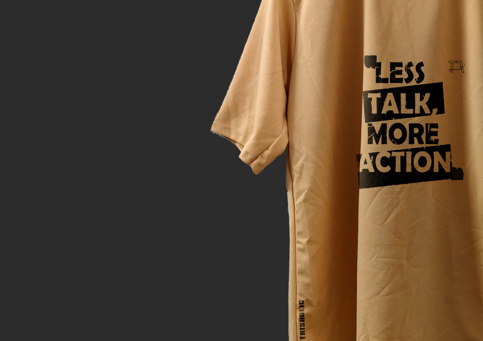 Lifestyle Photo of Model Wearing Tee Against Urban Wall