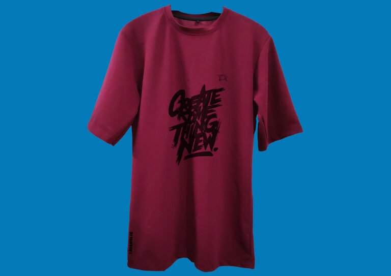 Front View of Trisholic Red Drop Shoulder T-Shirt on Model