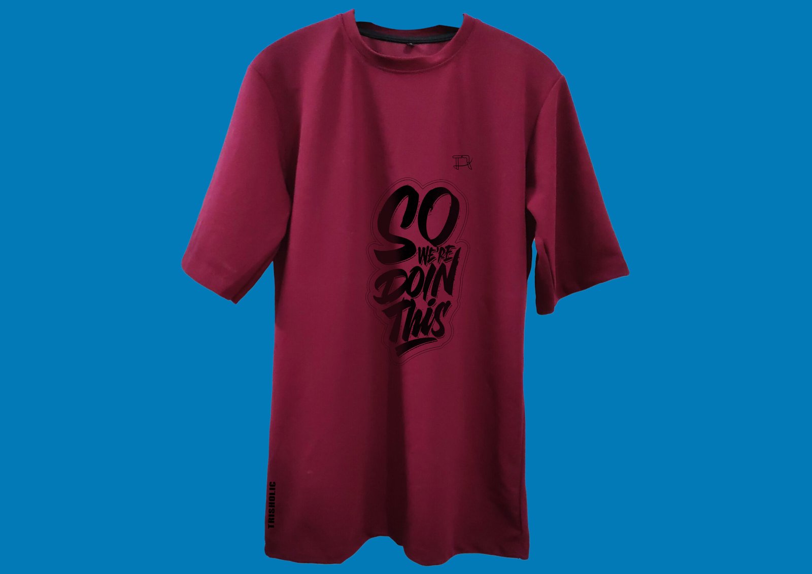 Front View of Trisholic Red Drop Shoulder T-Shirt on Model