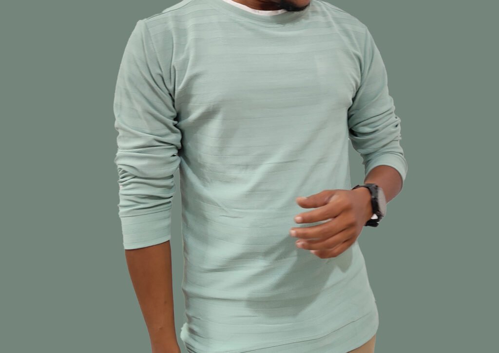 Fabric close-up of sea green full sleeve cotton-blend t-shirt