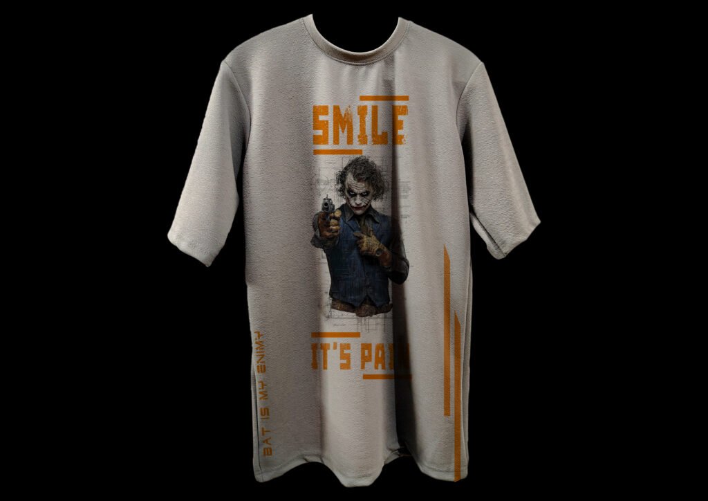 Joker Smile It’s Pain Grey Drop Shoulder Tee Front View joker t-shirt, drop shoulder tee, grey graphic tee, streetwear fashion, trisholic joker, oversized fit, casual wear, gamer t-shirt, joker print tee, trendy oversized tee